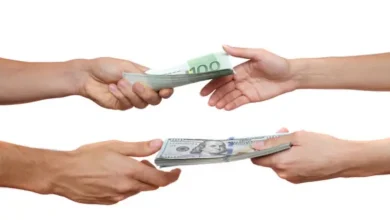 les taux de change sur le marché noir et officiel