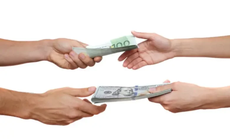 les taux de change sur le marché noir et officiel